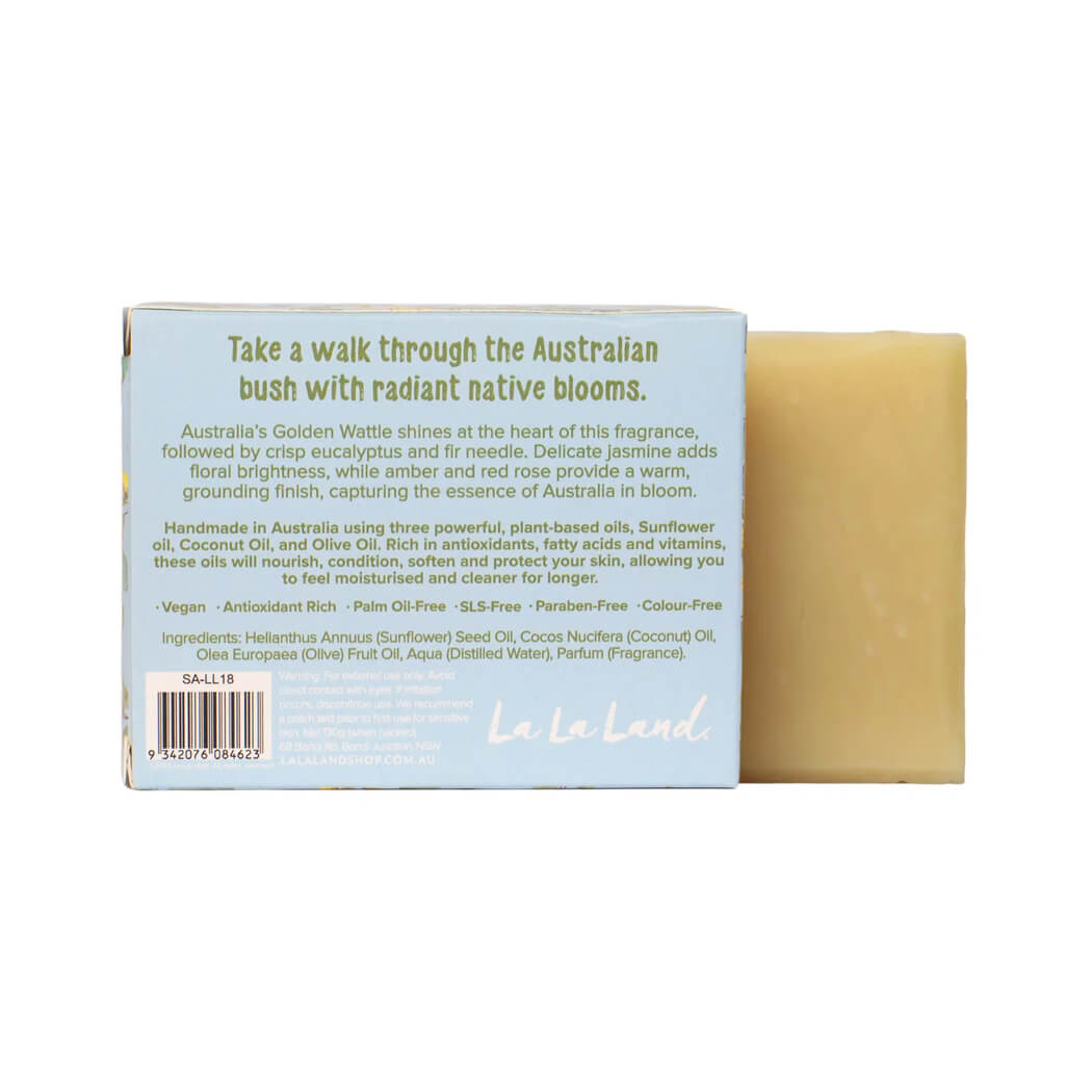 Australian made Golden Wattle Soap bar beside its packaging showing fragrance details and plant-based ingredients.