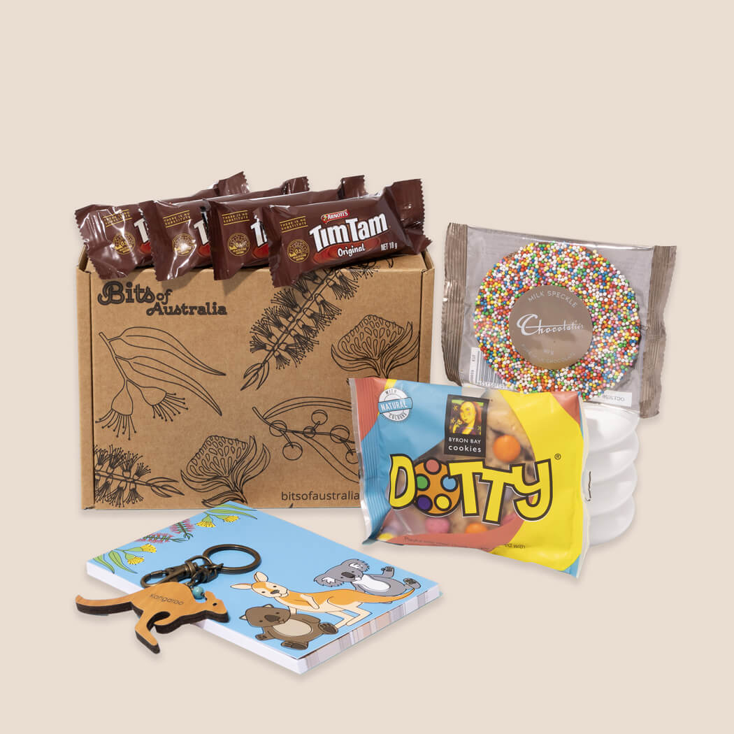 Australian souvenir gift box with Tim Tams, chocolate, cookie, kangaroo wooden keyring and Aussie animals notepad