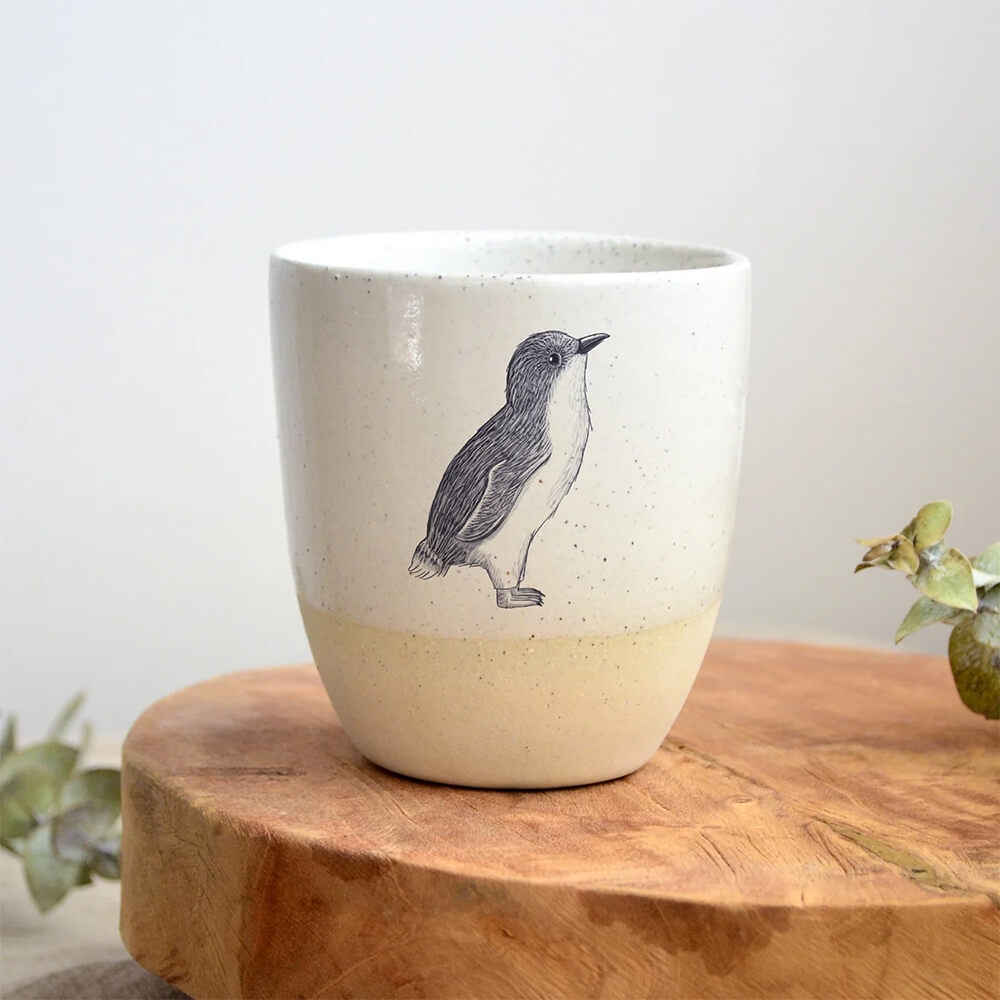 Australian Penguin Gifts and Souvenirs. Ceramic Cup by Kim Wallace and Renee Treml