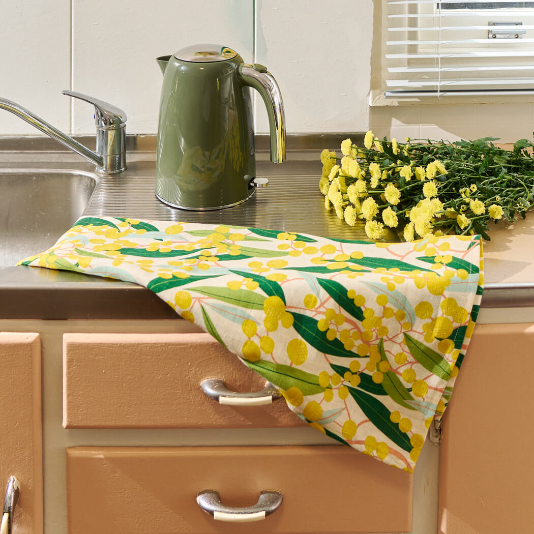 wattle australian made tea towel by annabel trends